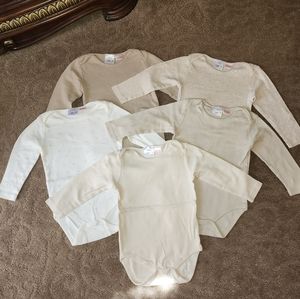 Five pack of toast colored bodysuits